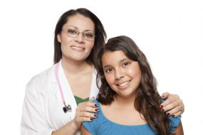 portrait of a female healthcare provider and young female teen