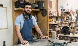 man working in wood workshop