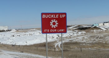 Road sign: Buckle up - it's our law