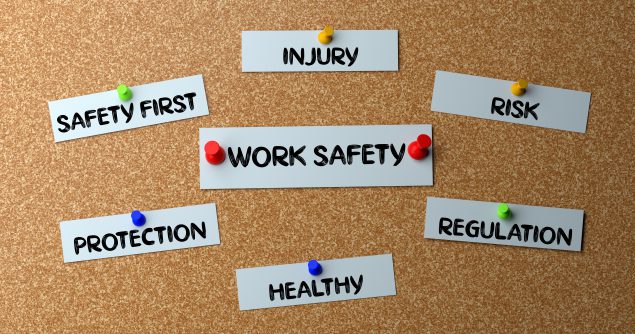 bulletin board with work safety phrases