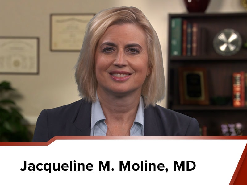 Dr. Jacqueline M. Moline MD facing the camera in an office environment