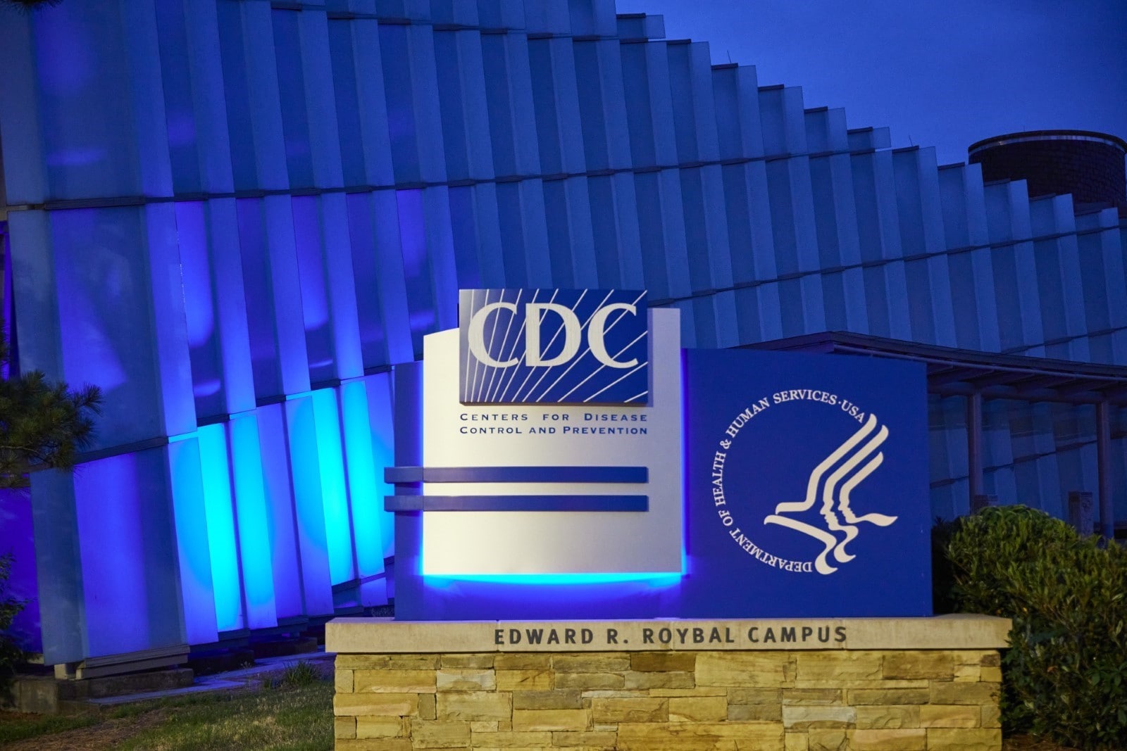 CDC Roybal campus Visitor Center lit up in blue light for ME/CFS awareness day