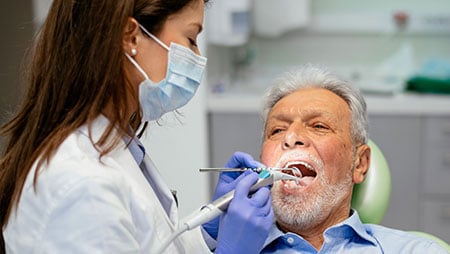 man in a dentist chair