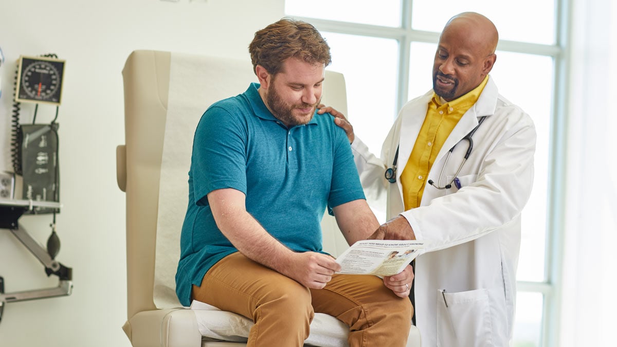 Healthcare Professional offering counseling to a patient.