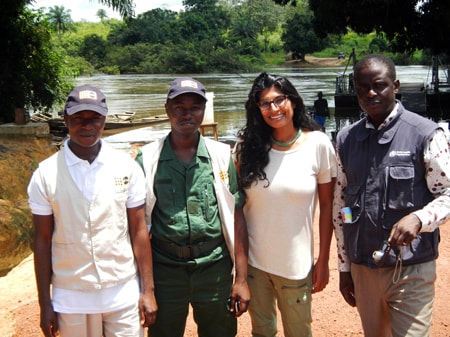 Photo: CDC disease detective Rupa with Guinean colleagues, at the river border between Guinea and Sierra Leone