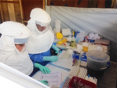 Team 5 members Aridth and Brandy in the “hot” lab in Bo, Sierra Leone.