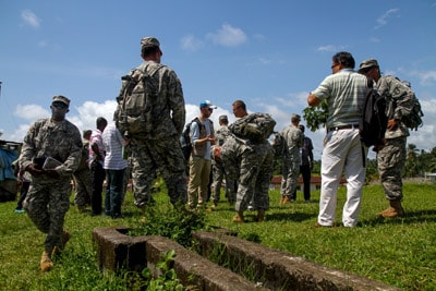 John Saindon with members of the U.S. Army identifying Ebola lab sites in Greenville, Liberia.