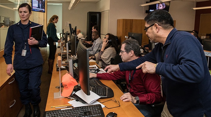 CDC staff support the COVID-19 response in the CDC’s Emergency Operations Center