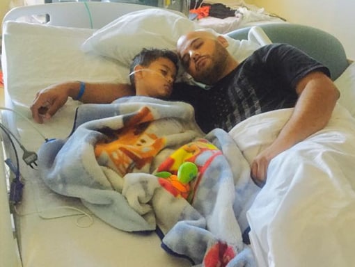 Francisco in the hospital with his dad.