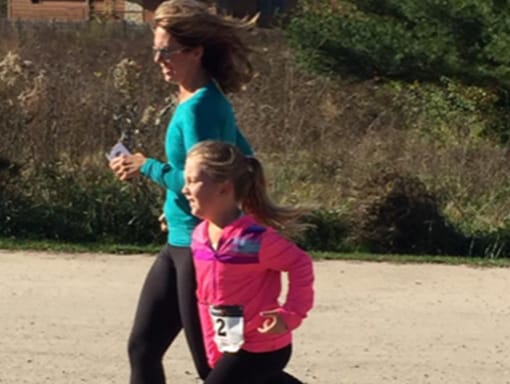 Laura jogging with her mom.