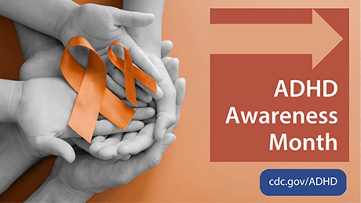 An informational graphic showing text on an orange background with multiple hands holding the ADHD ribbons