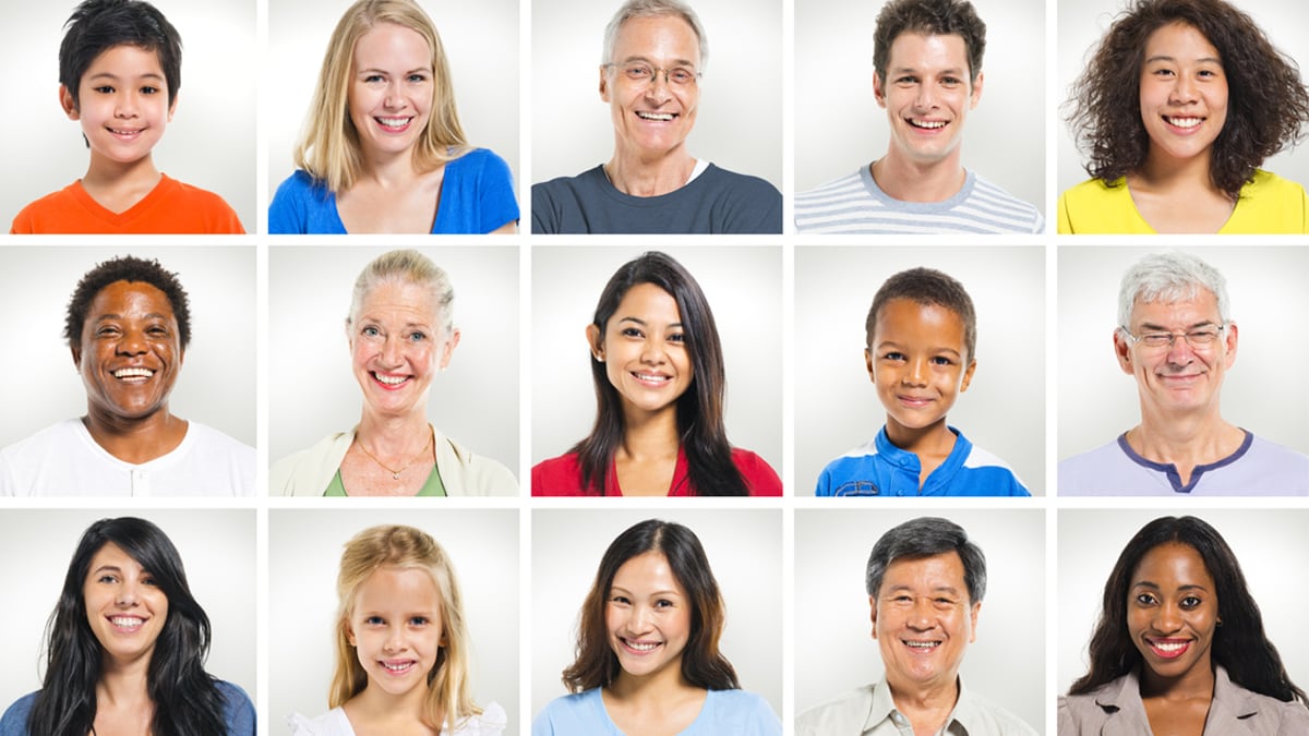 Multiple individual faces of people smiling in a grid format