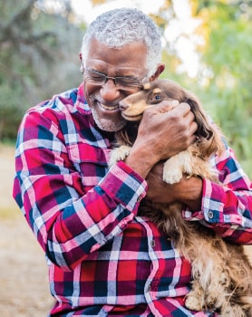 Elderly man with a dog