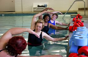 Older women participating in an aqua aerobics class