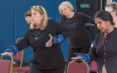 Participants stretching in an arthritis physical activity program