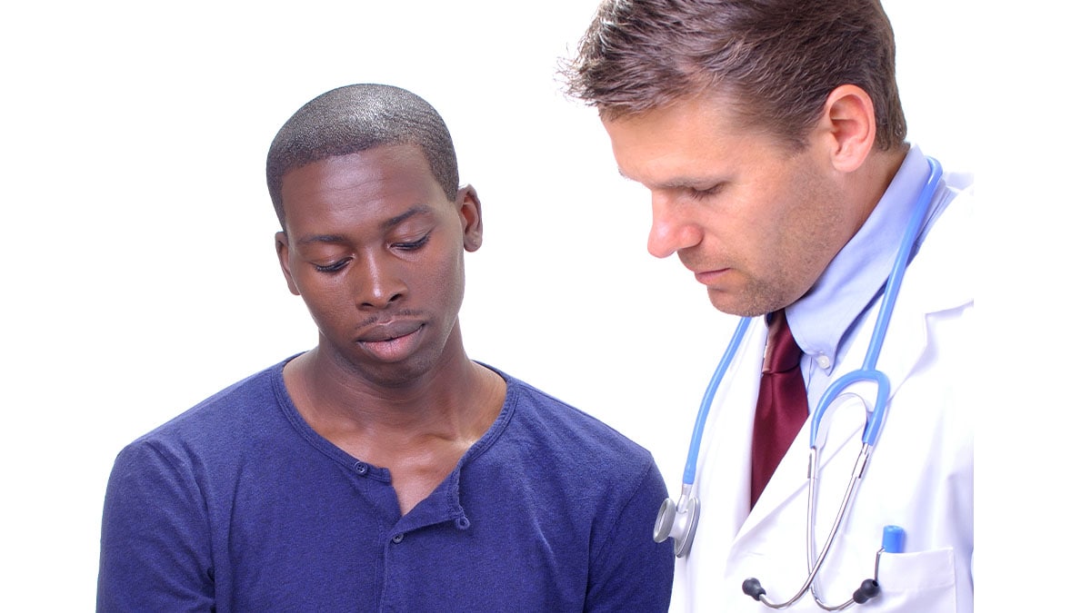Doctor reviewing asthma plan with patient