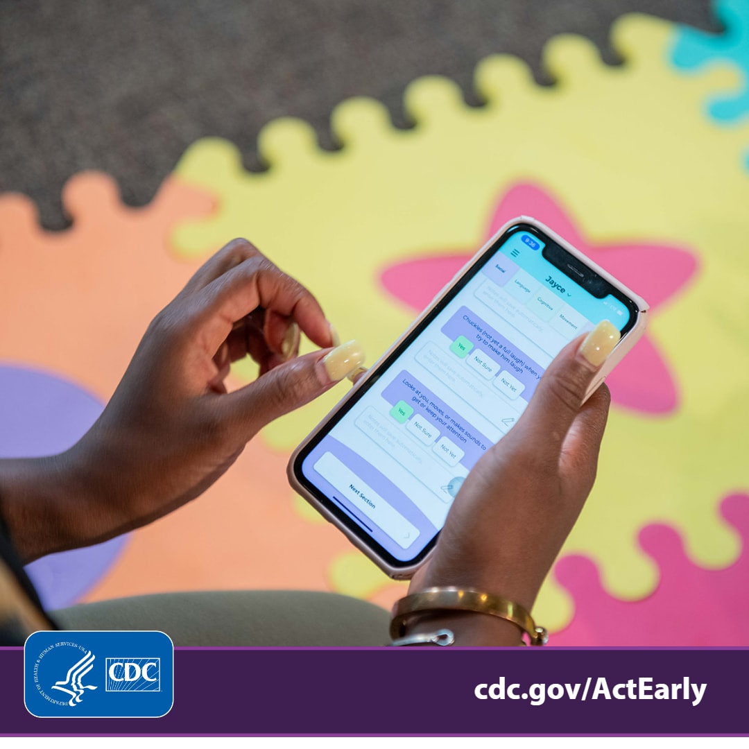 A person holding a smartphone that is displaying information from CDC's Milestone Tracker app. Text overlay reads, "cdc dot gov slash ActEarly."