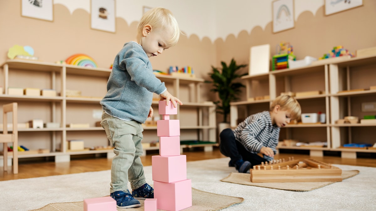 Two children playing with blocks during an evaluation