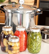 Canning: Pressure Cooker used for Preserving Homegrown Fruits Vegetables