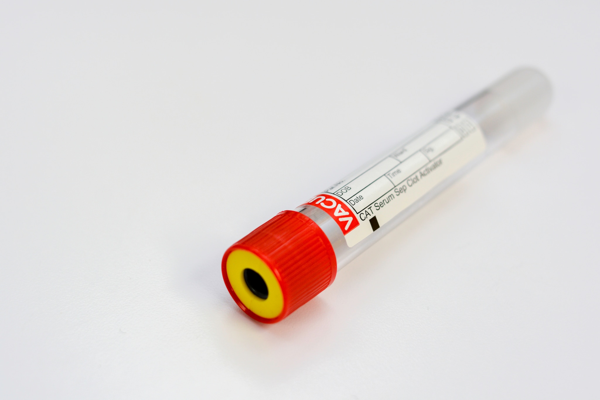 Collection tube with a red cap