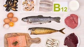 Photo of fish, eggs, and other foods rich in vitamin B12.