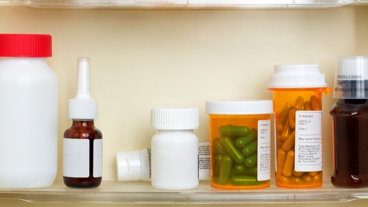 Assorted medications on a shelf.
