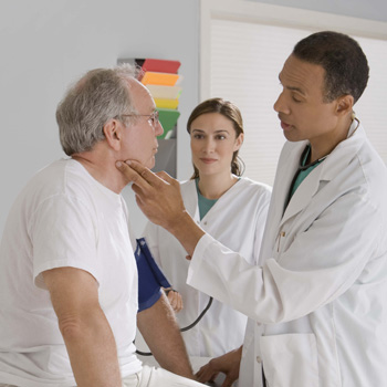 Doctors examining a patient