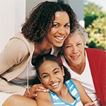 Photo of an African American family consisting of a mother, a daughter, and a grandmother