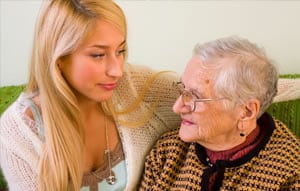Photo of young woman with her grandmother.