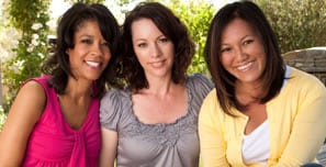 Photo of three young women.