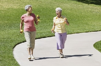 Photo of two women walking outdoors