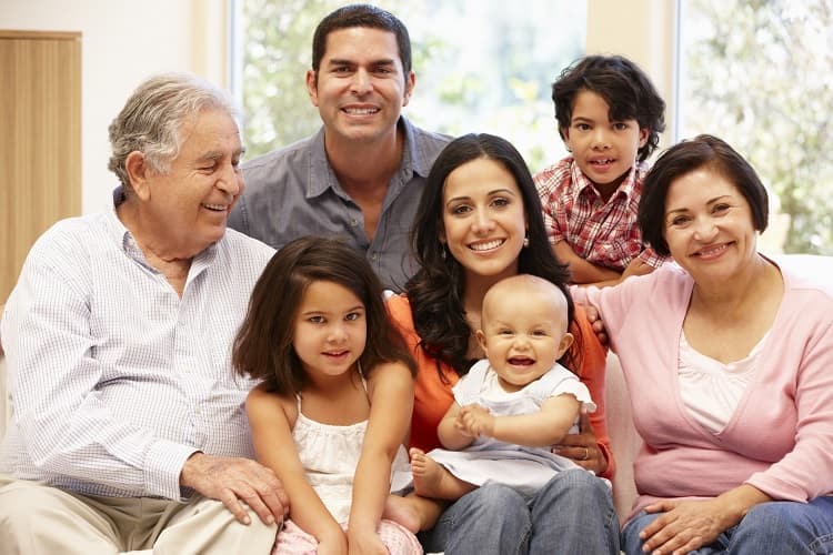 Three generations of a Hispanic family at home