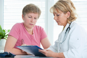 A doctor providing results to her patient.