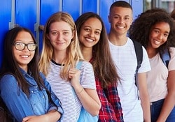 Photo of five teenagers.