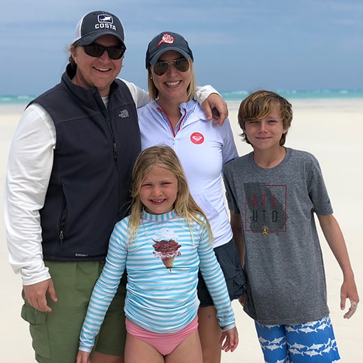 The Peters family staying sun-safe at the beach.