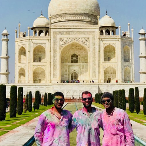 Photo of Ravi, Taylor, and Neil staying sun-safe while visiting the Taj Majal.