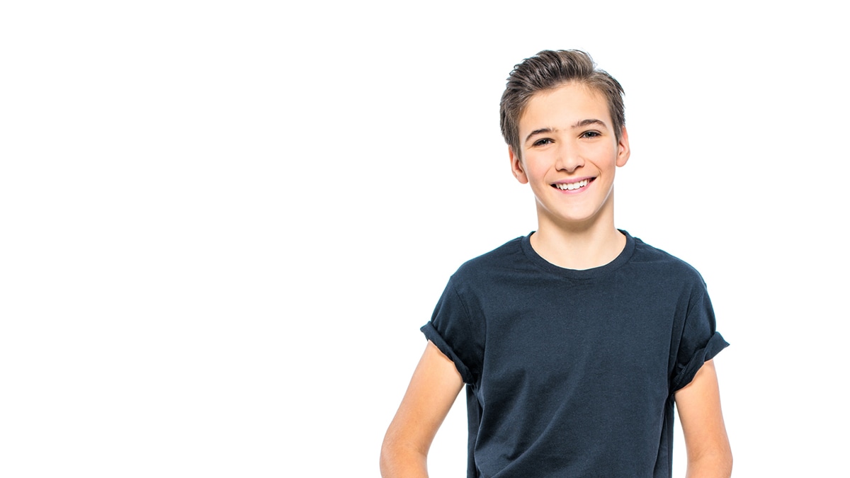 Young teen boy smiling