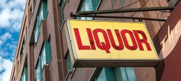 Liquor sign above a liquor store
