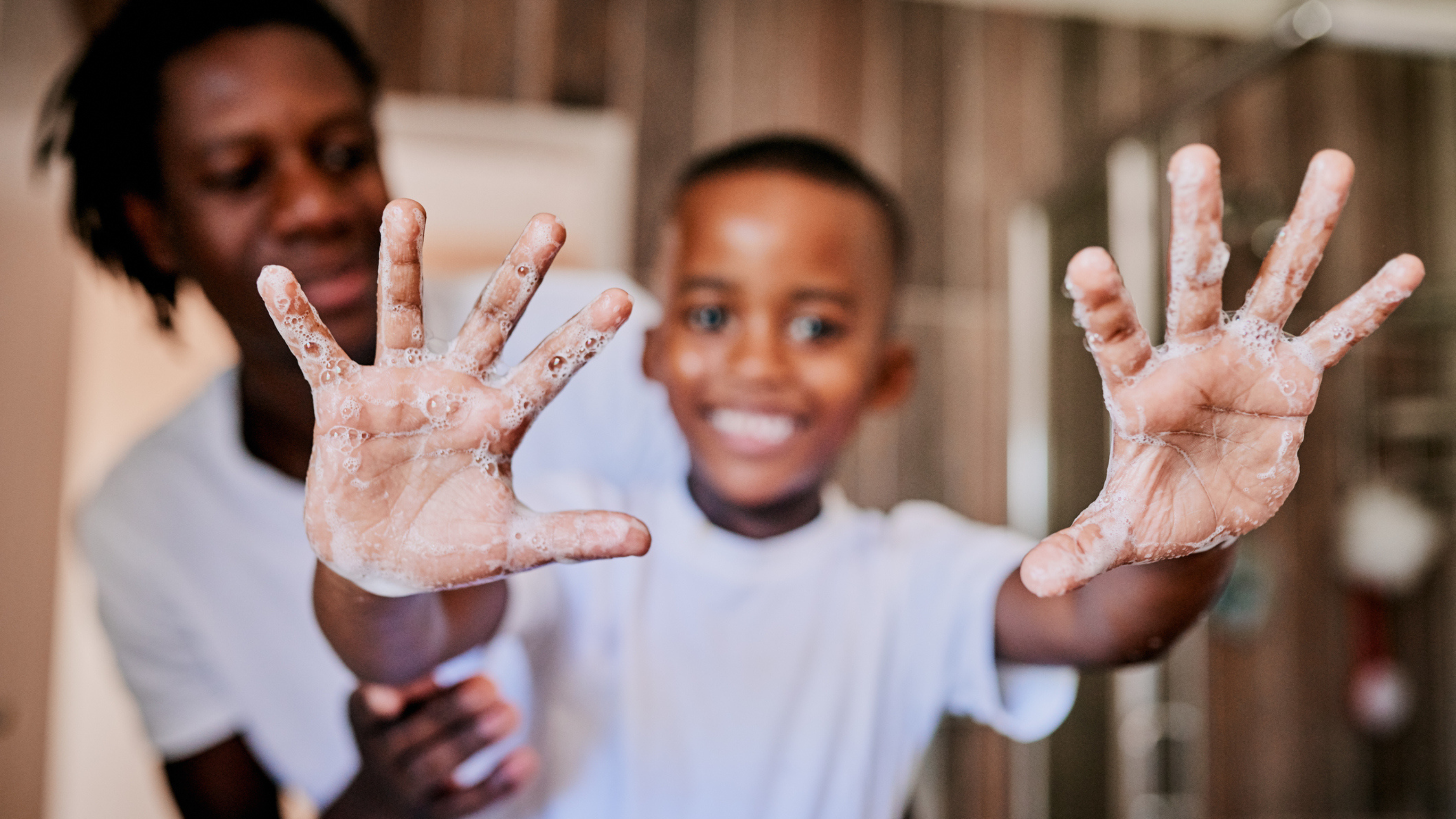 boy showing his clean hands