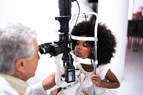 Girl on a medical appointment with ophthalmologist