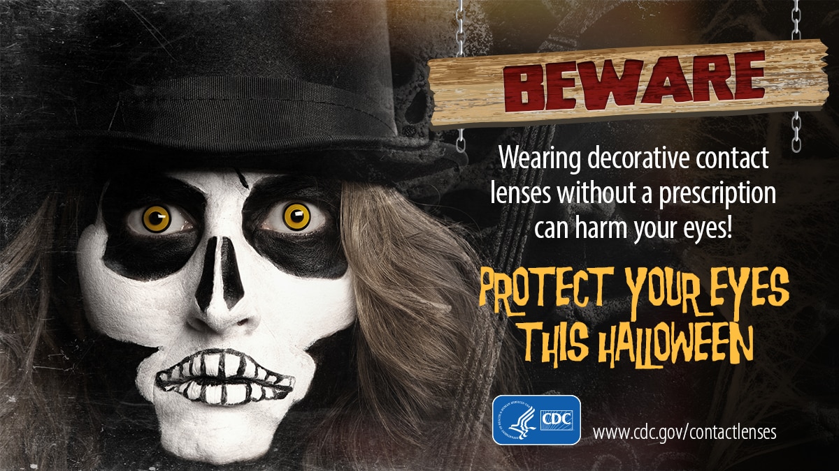 A person wearing a skeleton costume next to text that reads: Beware - wearing decorative contact lenses without a prescription can harm your eyes! Protect your eyes this Halloween.