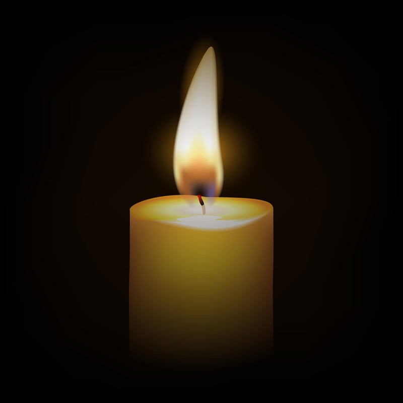 Candle in dark room