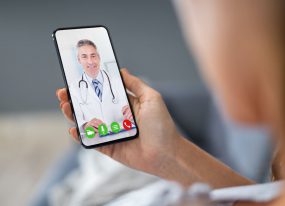 Pet Telemed Person talking to doctor on phone