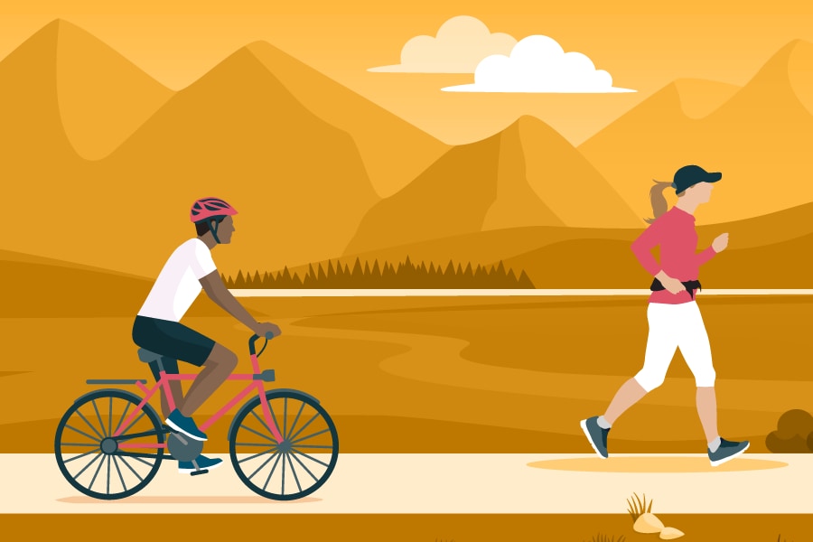A man is bicycling outdoors. A woman is running outdoors. They are keeping a safe distance from one another. 