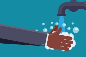 Illustration: washing hands with soap and water.