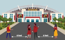 Image of people standing outside of a stadium