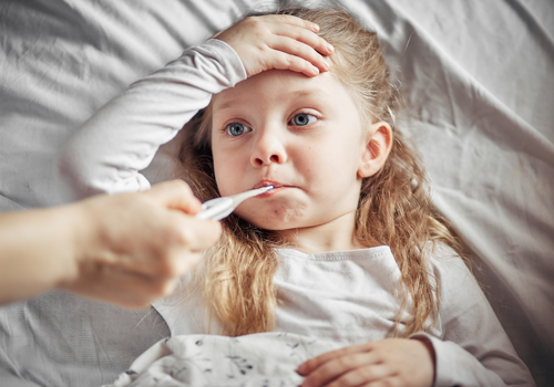 Person caring for a sick child