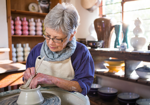 A woman making pottery