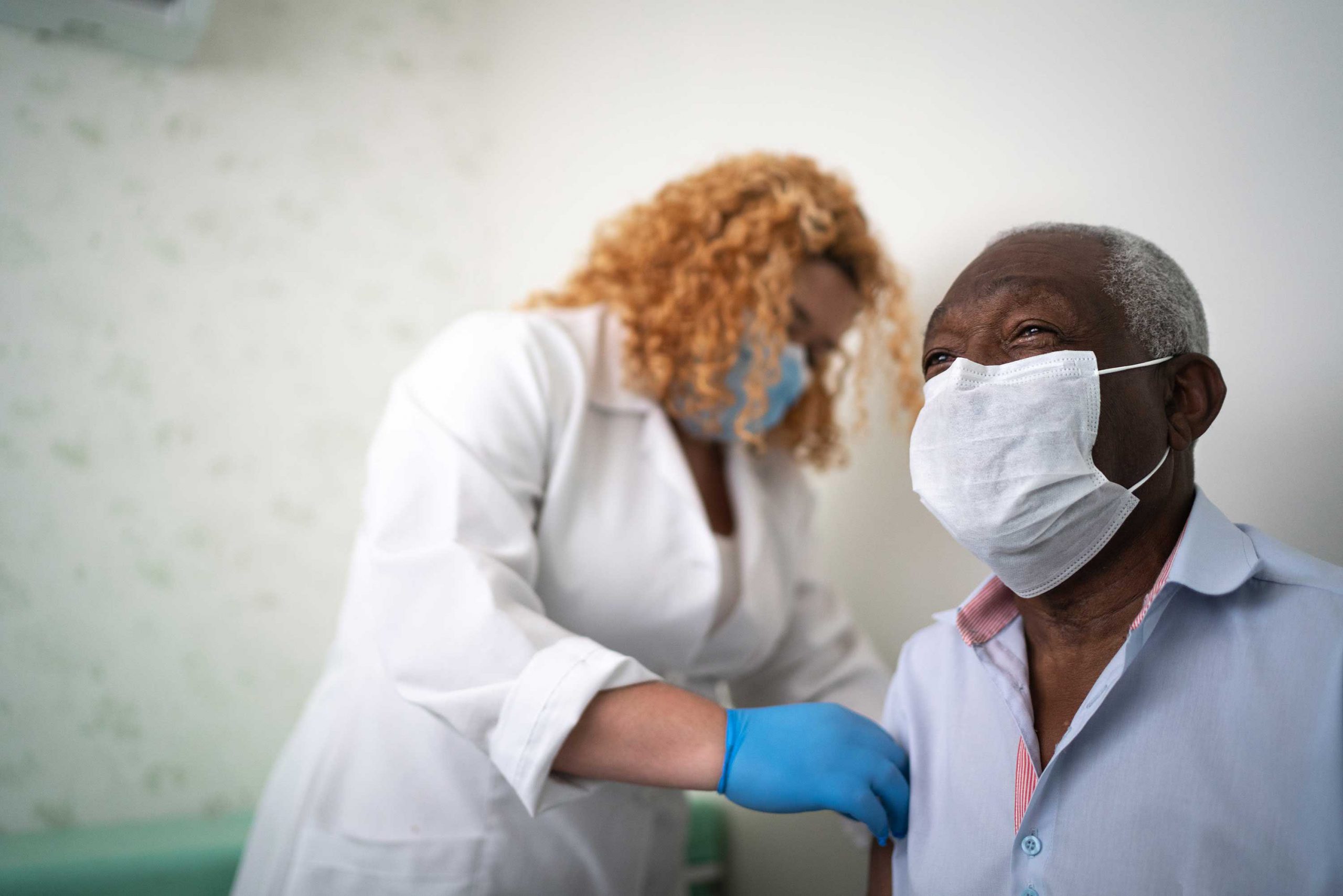 Person receiving the COVID-19 vaccine.