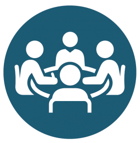 Icon showing four people sitting around a table.